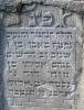 Here lies a lovely pleasant boy  
who was plucked in his prime at the age
of 7 years and 2 months, Pinchas Eliyahu son of our teacher
the rabbi Dawid [David] May his light shine
died on 19 Elul 5663 by the abbreviated era  
 [11 September 1903]
 May his soul be bound in the bond of everlasting life  
life  Translated by Sara Mages (smages@comcast.net)