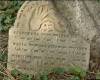 The hands held in benediction are the symbol of the Cohens.

A tombstone for a man died 5514 [1753/4]