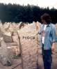 Ada Holzman near the symbolic tombtone for Plock in Treblinka