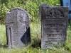 The stone on the left side - Sura Pesza Weisman
Here lies
an important and modest woman
Sara [Sure] Pesha
daughter of Tzvi  [Tsvi, Zwi, Cwi]
wife of Reb Yosef [Joseph]
Weismann 
from ? 
died 18 Elul 5672 [31 August 1912]
May her soul be bound in the bond of everlasting life
Translated by Mages smages@comcast.net